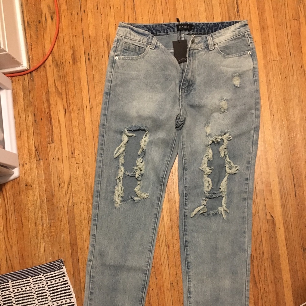 Light/Medium wash distressed boyfriend jeans!